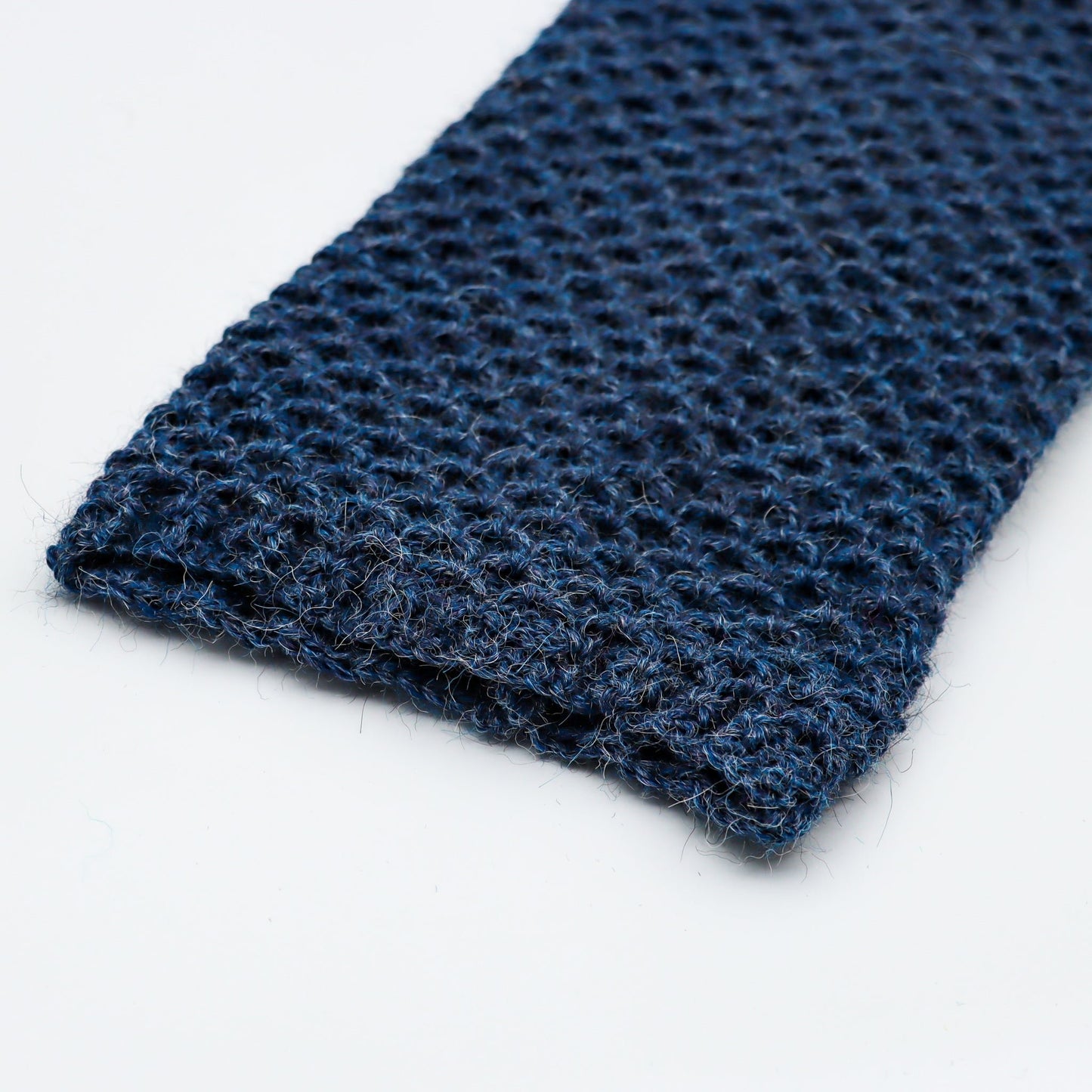 Leggvarmere alpakka melert mørk blå - PREG Interiør