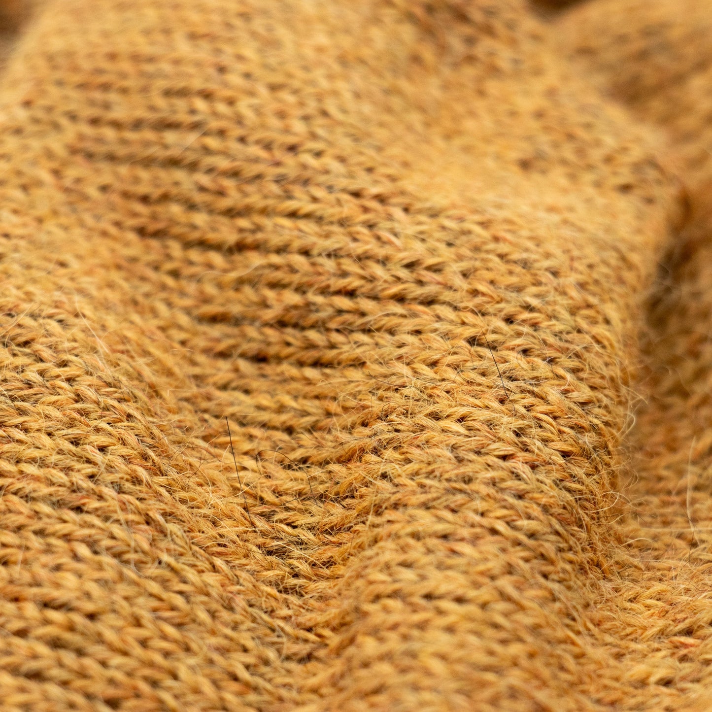 PANNEBÅND TVIST ALPAKKA MELERT HONNING - GUL - PREG Interiør