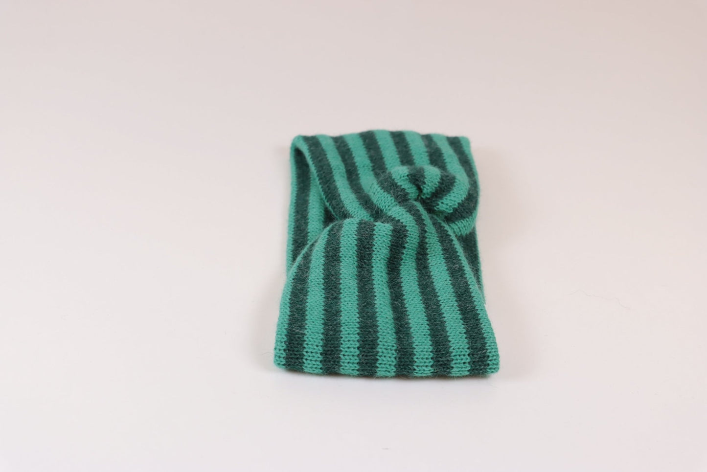 PANNEBÅND TVIST ALPAKKA STRIPET TURKIS/MELERT MØRK TURKIS - PREG Interiør
