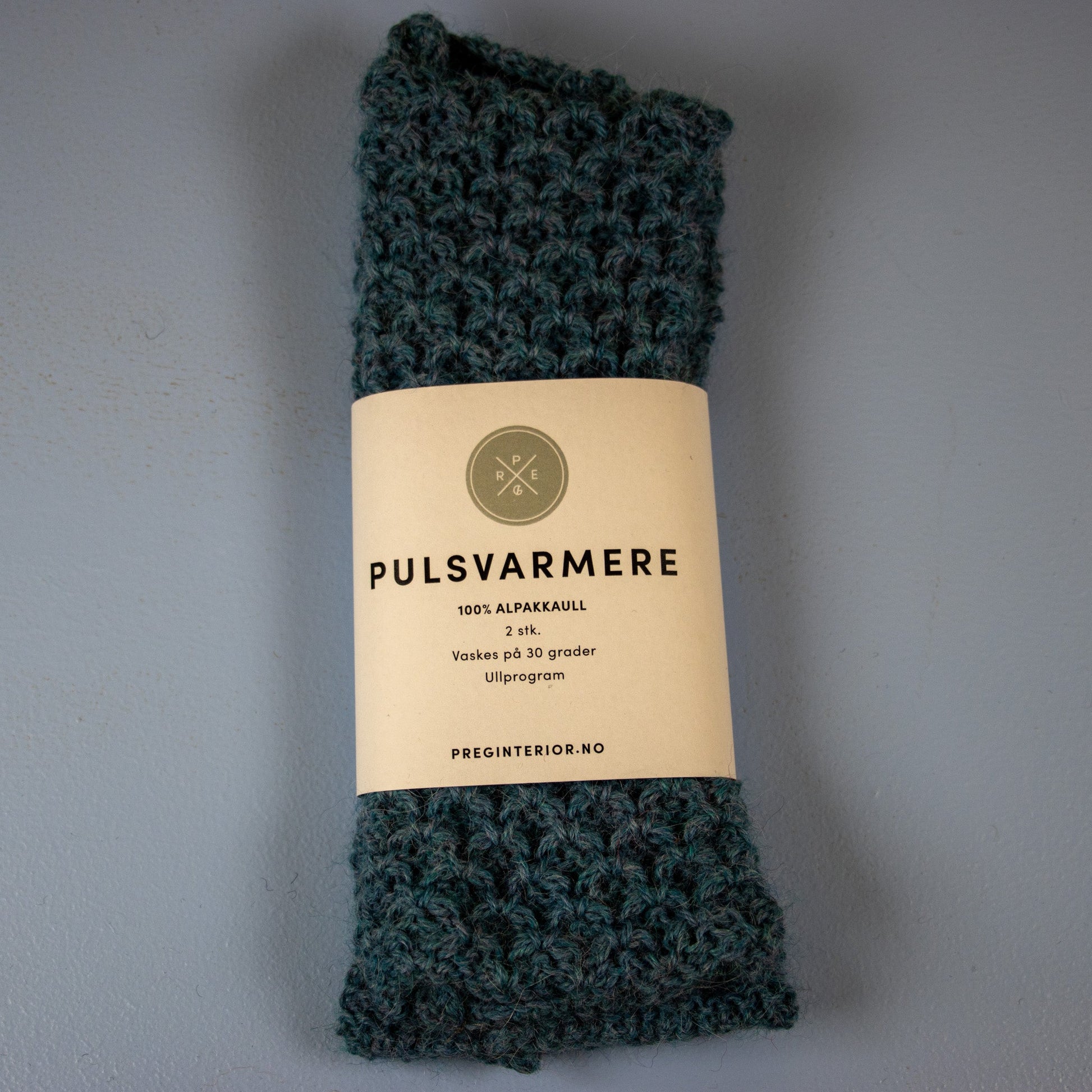 Pulsvarmere alpakka melert lys blå - PREG Interiør