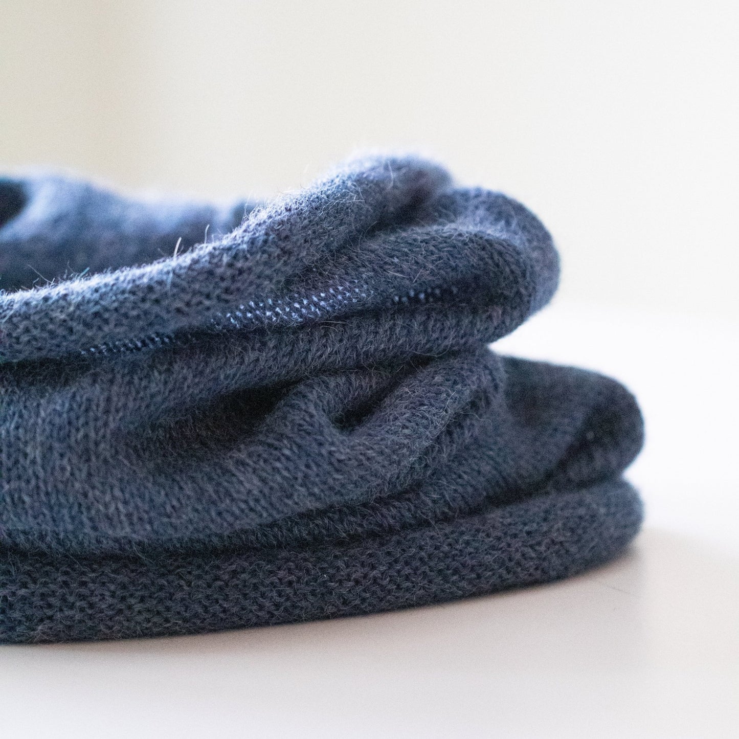 BUFF ALPAKKA MELERT MØRK BLÅ - PREG Interiør