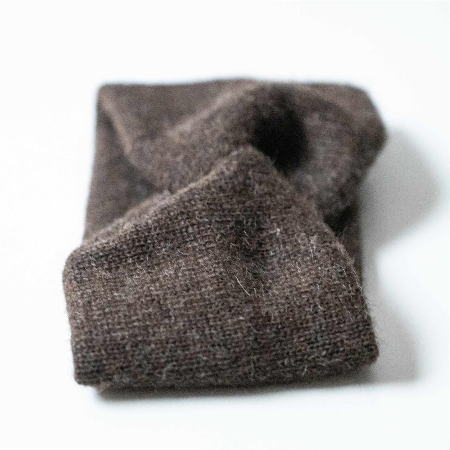 PANNEBÅND TVIST ALPAKKA MELERT BRUN - PREG Interiør