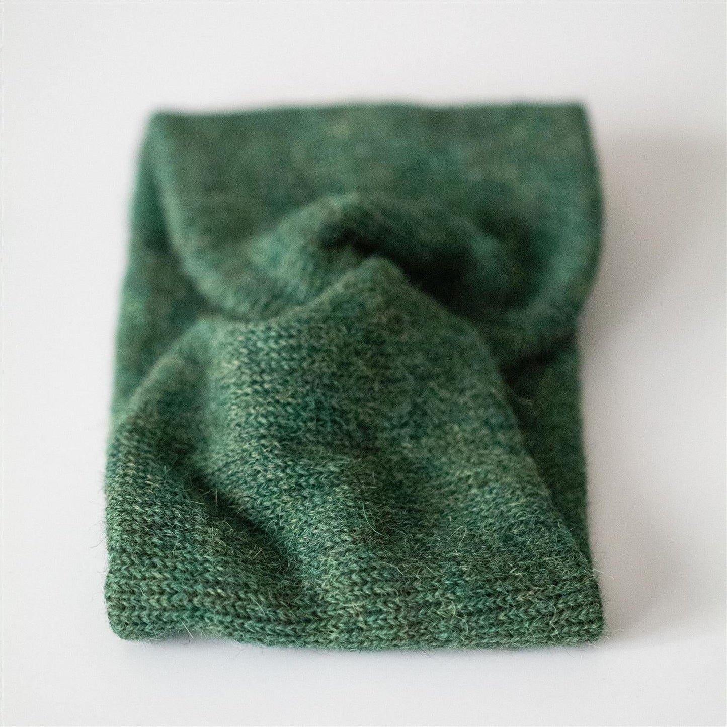 PANNEBÅND TVIST ALPAKKA MELERT GRØNN - PREG Interiør