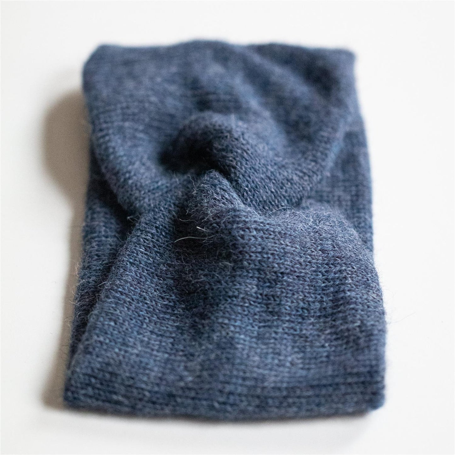 PANNEBÅND TVIST ALPAKKA MELERT MØRK BLÅ - PREG Interiør