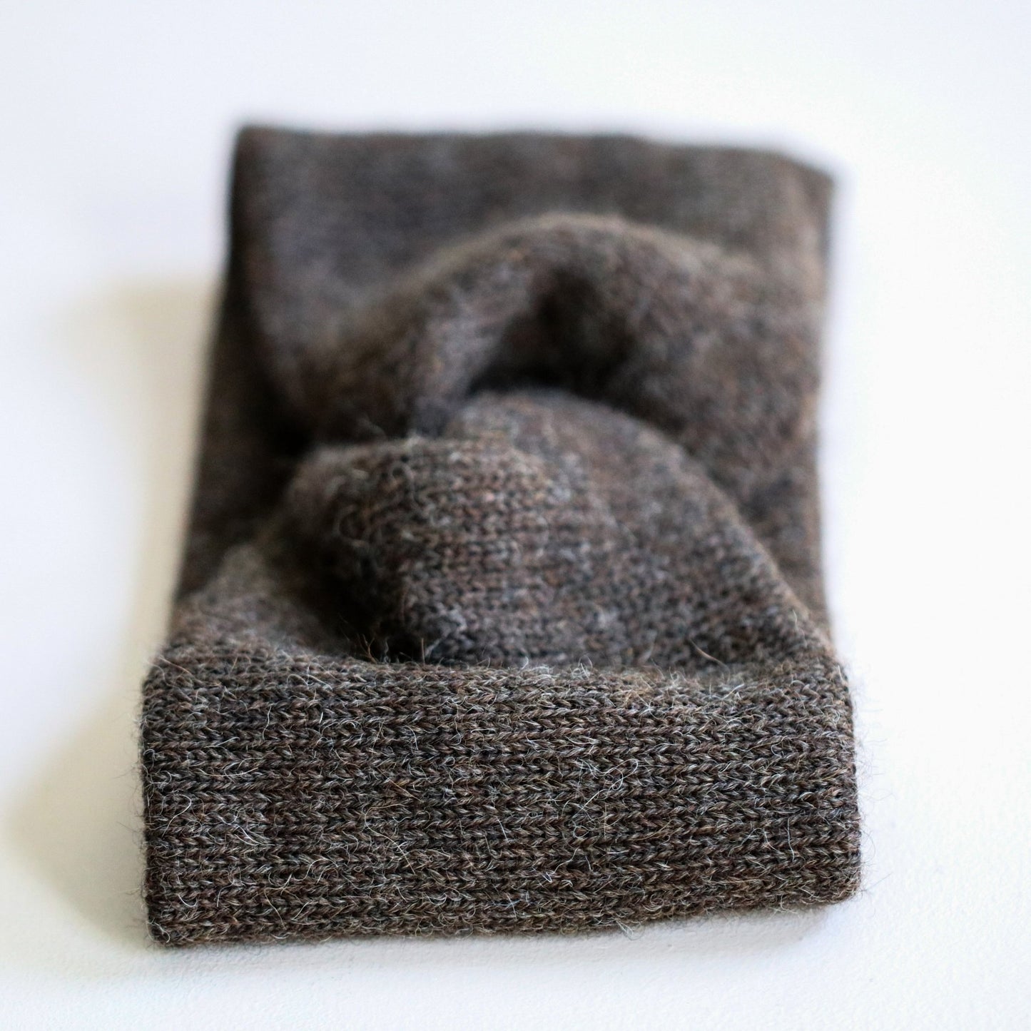 PANNEBÅND TVIST ALPAKKA MELERT MØRK BRUN - PREG Interiør