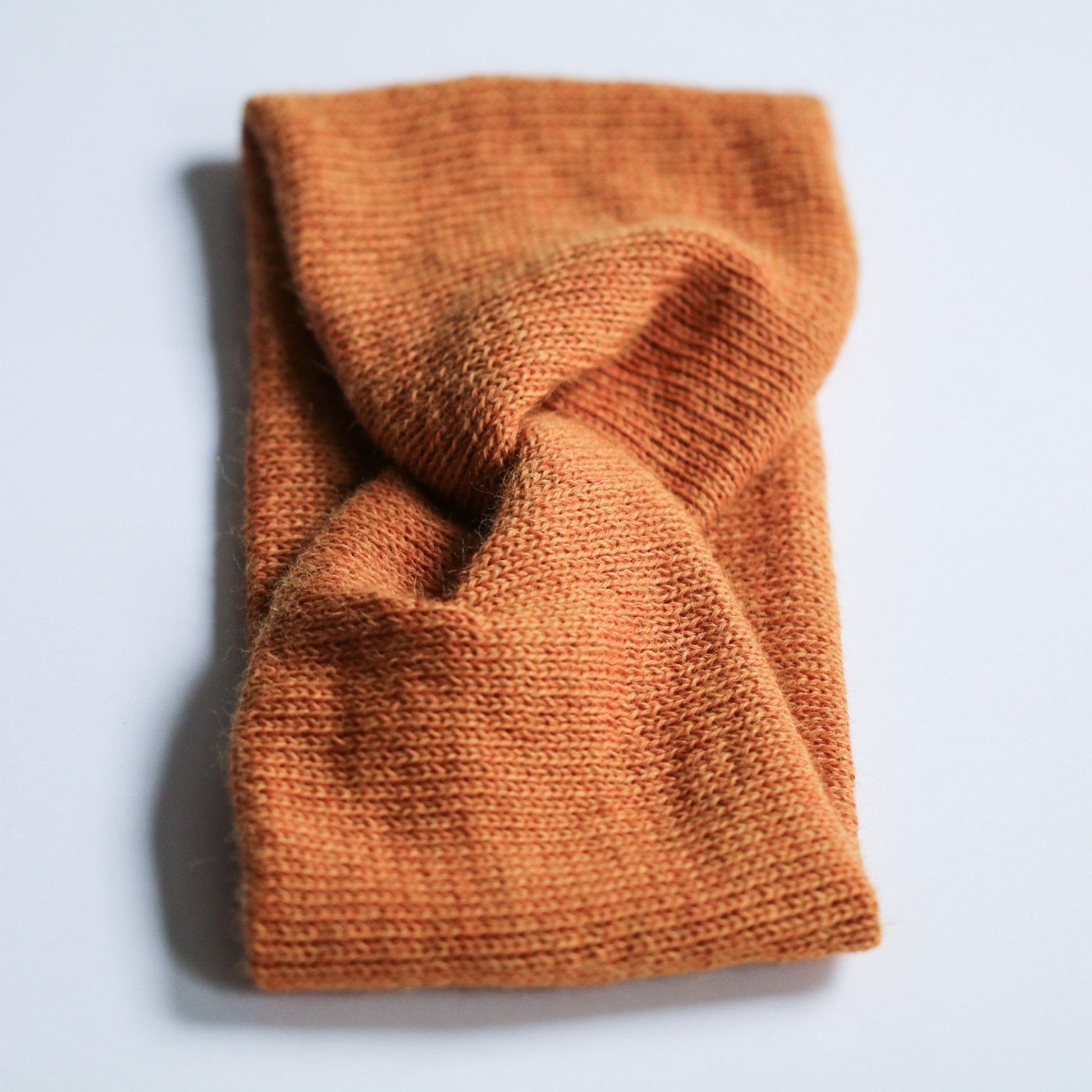PANNEBÅND TVIST ALPAKKA ORANGE - PREG Interiør