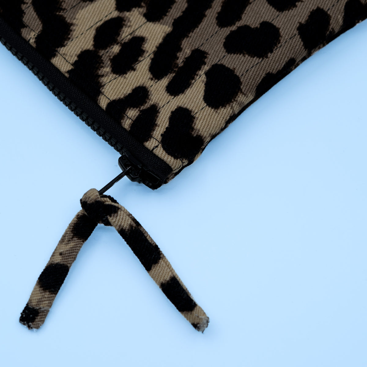 Quiltet clutch liten leopard