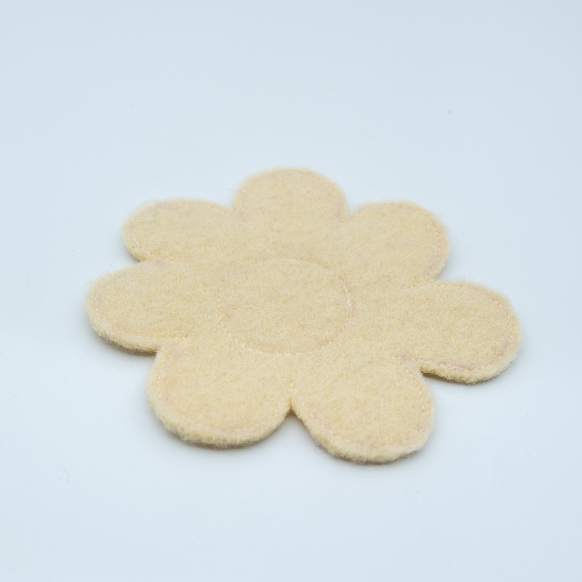 Glassbrikke ull blomst lys gul - PREG Interiør