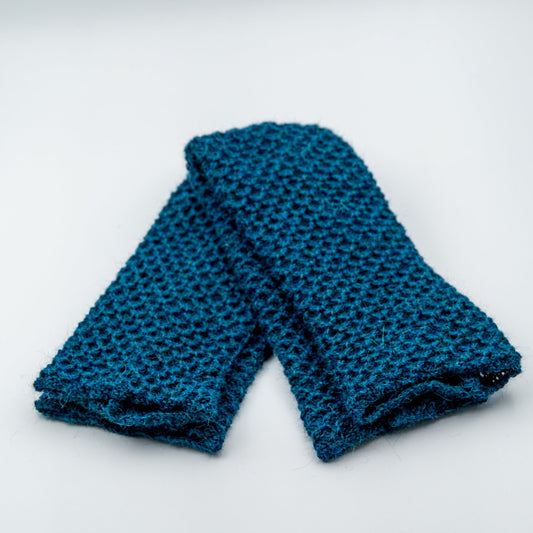 Leggvarmere alpakka melert mørk petrol - PREG Interiør