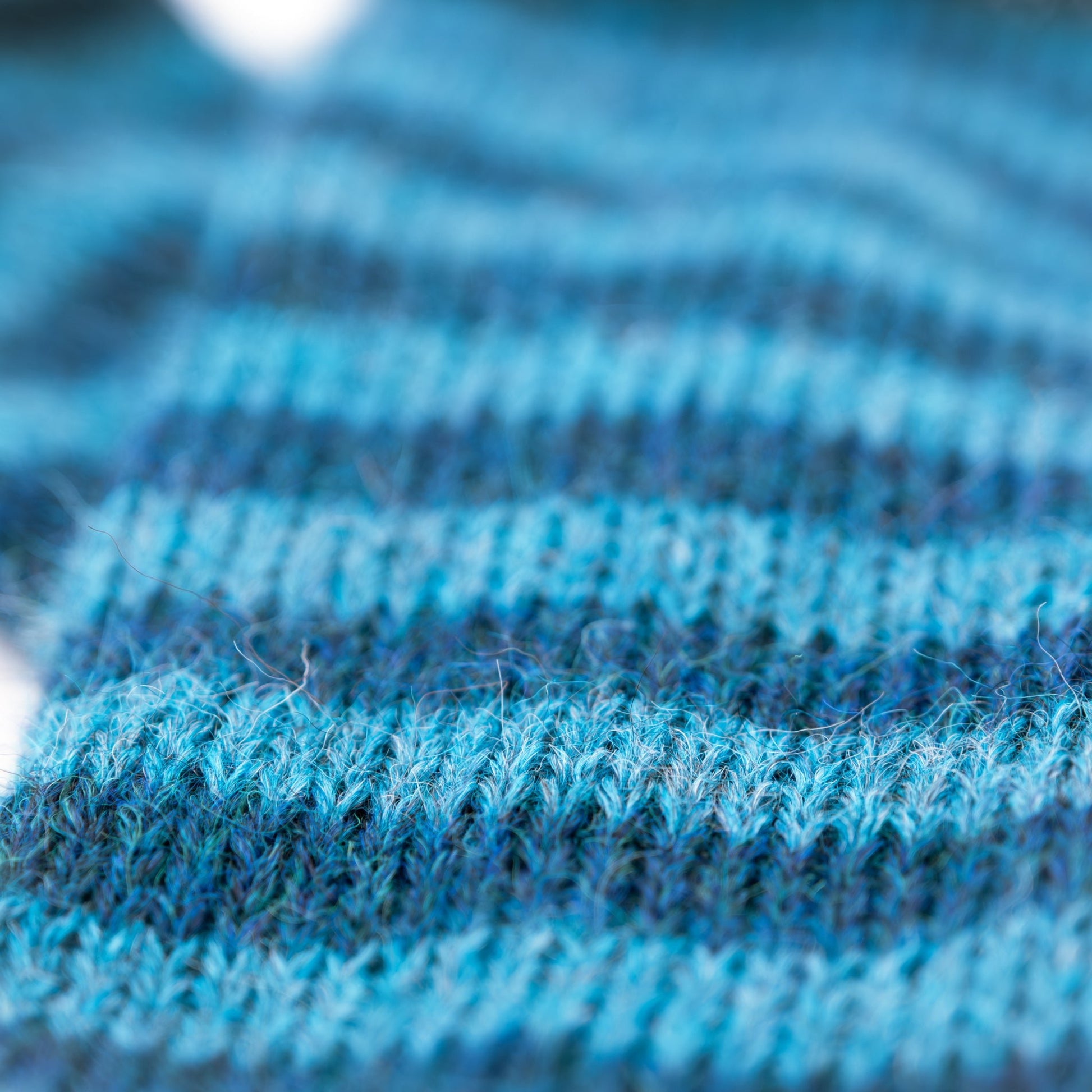 Pulsvarmere alpakka melert mørk blå/ melert petrol - PREG Interiør