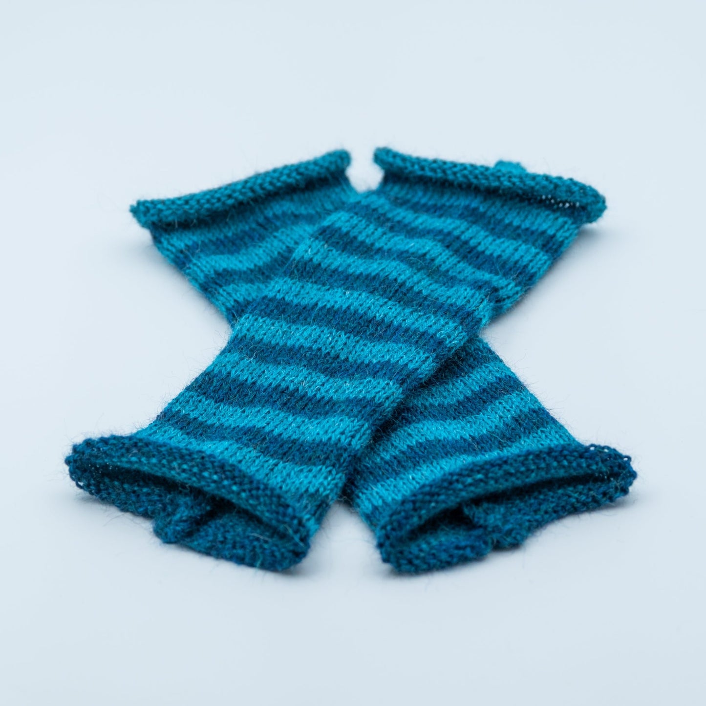 Pulsvarmere alpakka melert mørk blå/ melert petrol - PREG Interiør