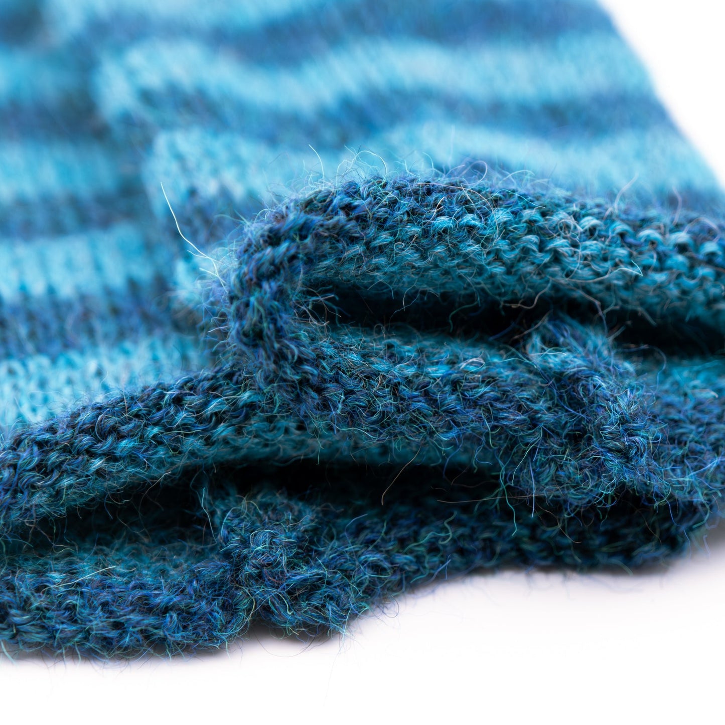 Pulsvarmere alpakka melert mørk blå/ melert petrol - PREG Interiør