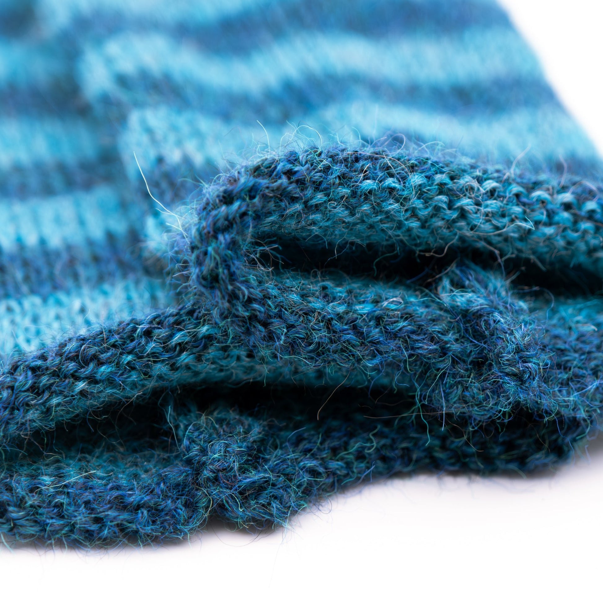 Pulsvarmere alpakka melert mørk blå/ melert petrol - PREG Interiør