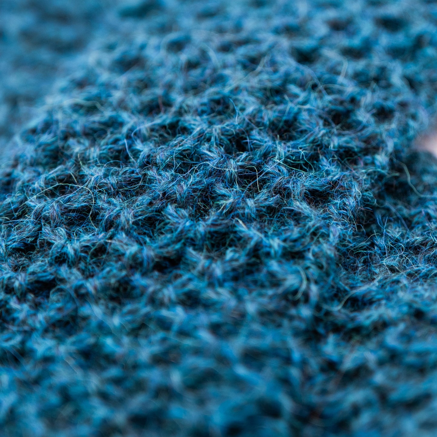 Pulsvarmere alpakka melert mørk petrol - PREG Interiør