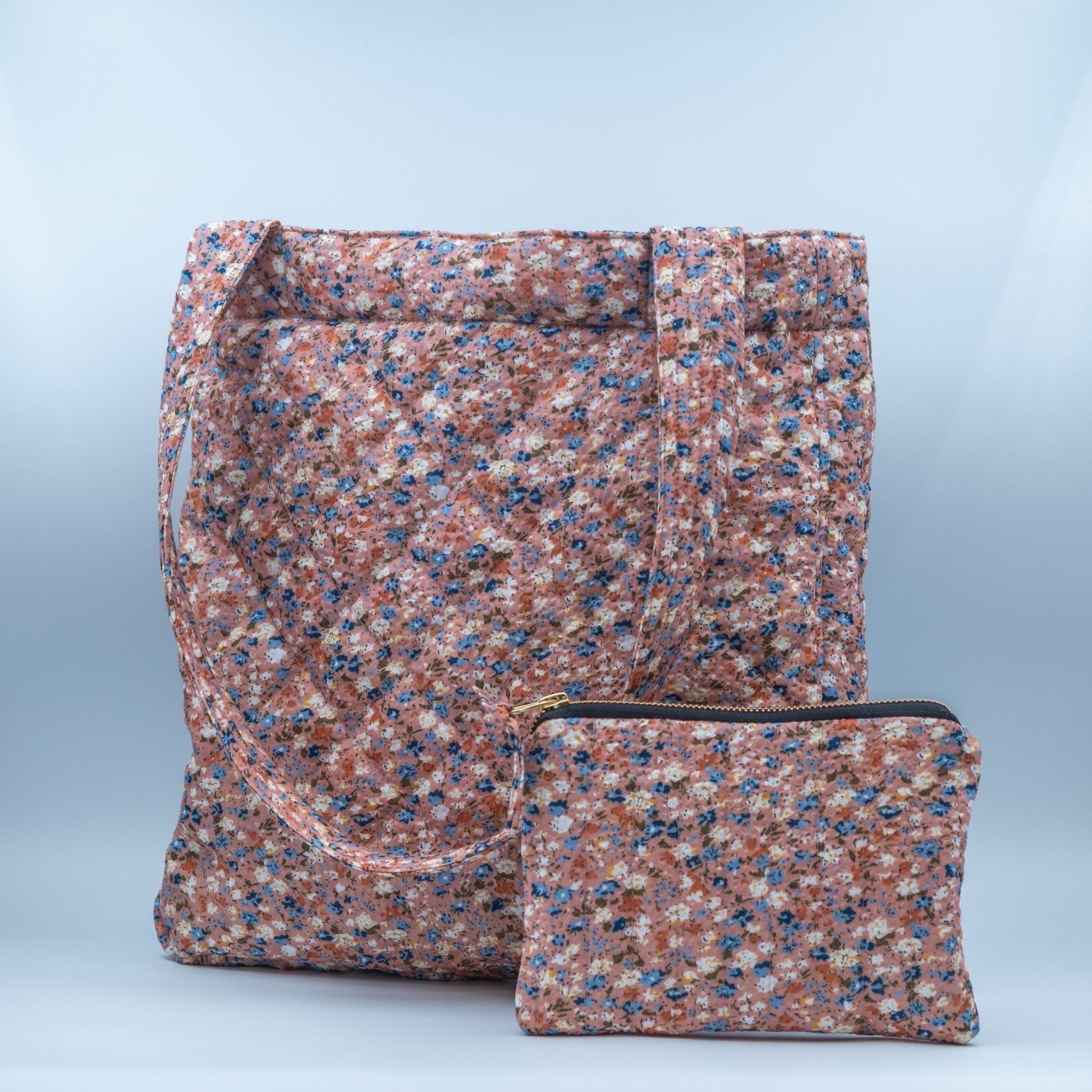 Quiltet clutch liten gammelrosa med blomster - PREG Interiør