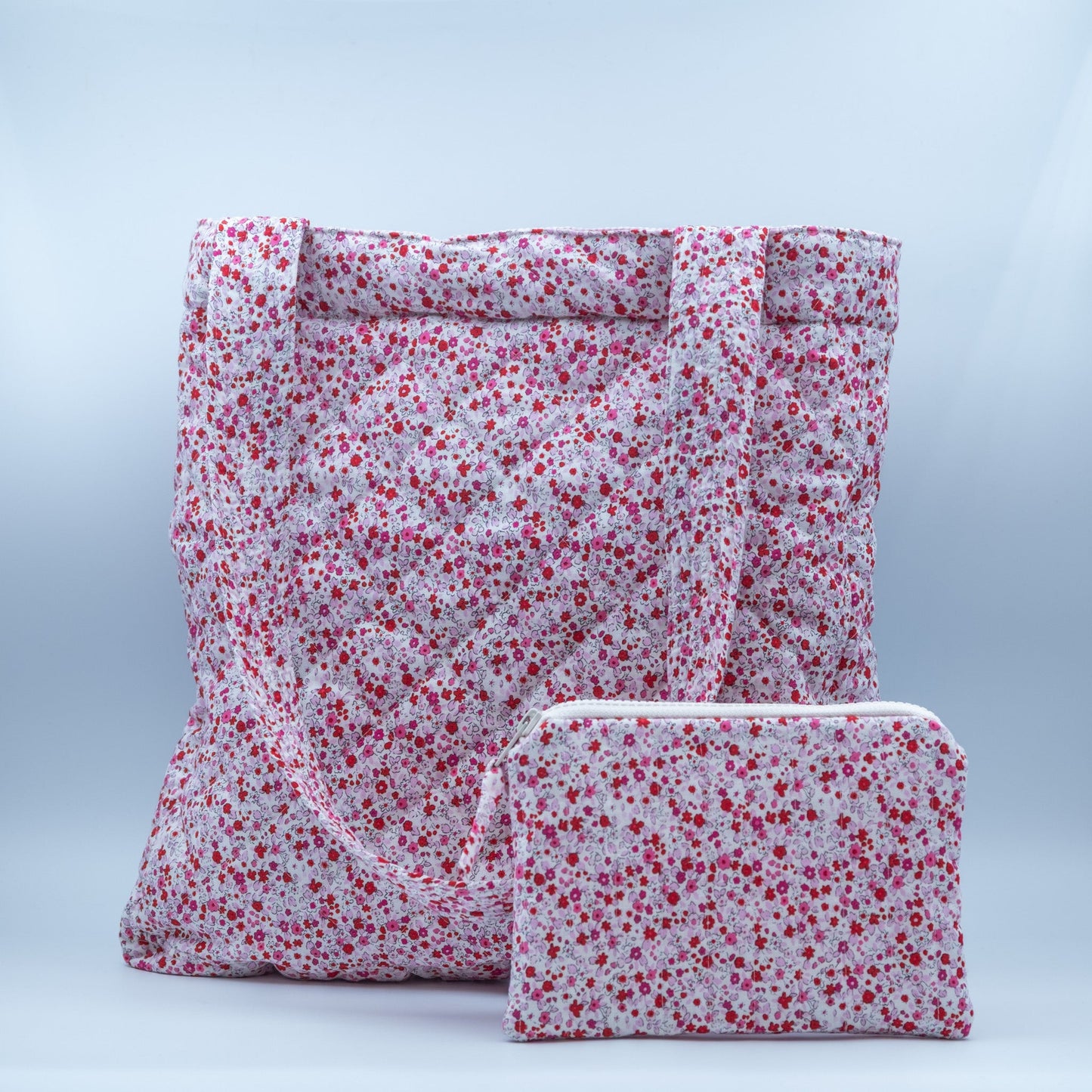 Quiltet clutch liten hvit med rosa blomster - PREG Interiør