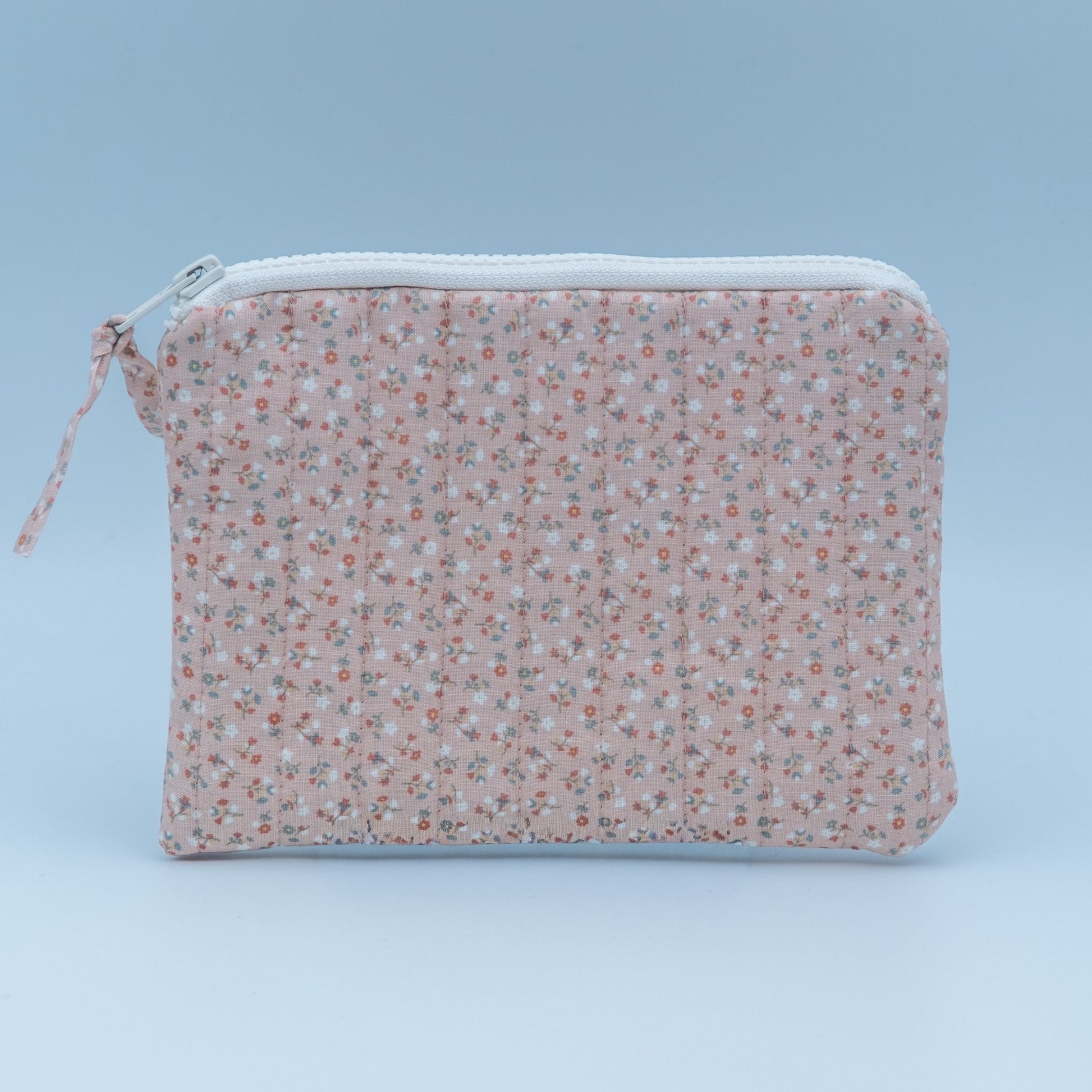 Quiltet clutch liten rosa med blomster - PREG Interiør